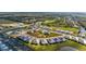 Aerial view of community with houses and golf course at 10732 Klee Ave, Bradenton, FL 34212