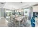 Open concept dining area with access to living room and kitchen at 10732 Klee Ave, Bradenton, FL 34212