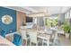 Open concept dining room with view to backyard at 10732 Klee Ave, Bradenton, FL 34212