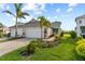 Two-story home with attached garage and landscaped lawn at 10732 Klee Ave, Bradenton, FL 34212