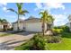Two-story home with attached garage and landscaped yard at 10732 Klee Ave, Bradenton, FL 34212