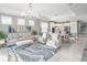 Spacious living room with light and airy feel and access to outdoor patio at 10732 Klee Ave, Bradenton, FL 34212