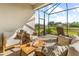Outdoor patio with seating area offers scenic views and comfortable lounging at 10732 Klee Ave, Bradenton, FL 34212
