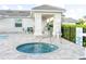 Community spa with easy access and ample seating at 10732 Klee Ave, Bradenton, FL 34212