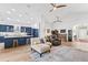 Modern kitchen with blue cabinetry, large island, and stainless steel appliances at 12147 Maple Ridge Dr, Parrish, FL 34219