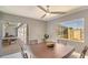 Bright dining room with sliding glass doors leading to the pool area at 1226 Lucaya Ave, Venice, FL 34285