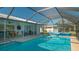 Refreshing pool area with screened enclosure at 1226 Lucaya Ave, Venice, FL 34285