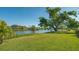 Peaceful waterfront property with mature trees at 1226 Lucaya Ave, Venice, FL 34285