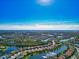 Expansive aerial view of a luxurious waterfront community at 19864 Petrino St, Venice, FL 34293