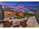 Enjoy sunsets from the covered patio by the pool at 19864 Petrino St, Venice, FL 34293