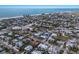 Aerial view of a charming coastal home with ocean views and a desirable location at 213 83Rd St # East, Holmes Beach, FL 34217