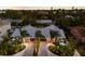 Stunning aerial view of a charming home with lush landscaping at 213 83Rd St # East, Holmes Beach, FL 34217