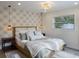 Spacious bedroom with a comfy bed and stylish wall decor at 213 83Rd St # East, Holmes Beach, FL 34217