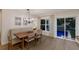 Casual dining area with a built-in bench and view of the pool at 213 83Rd St # East, Holmes Beach, FL 34217