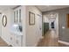 Bright hallway with built-in cabinetry and access to other rooms at 213 83Rd St # East, Holmes Beach, FL 34217