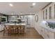 Bright white kitchen with an island and built-in cabinetry at 213 83Rd St # East, Holmes Beach, FL 34217