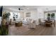 Open concept living and dining area with light and airy feel at 213 83Rd St # East, Holmes Beach, FL 34217