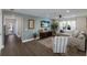 Spacious living room with light walls, comfy seating, and large TV at 213 83Rd St # East, Holmes Beach, FL 34217