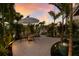 Relaxing patio area with outdoor seating and tropical landscaping at 213 83Rd St # East, Holmes Beach, FL 34217