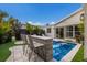 Backyard oasis with a private pool and bar at 213 83Rd St # East, Holmes Beach, FL 34217