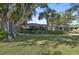 Charming mid-century home nestled amongst mature trees at 2814 Suncrest Dr, Sarasota, FL 34239