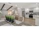 Modern kitchen with stainless steel appliances and white shaker cabinets at 2828 Grand Cayman St, Sarasota, FL 34231