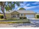 House exterior showcasing a one-story home with a front yard at 3229 6Th W Ave, Palmetto, FL 34221