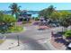 An aerial view of the marina entrance with palm trees and parking at 3229 6Th W Ave, Palmetto, FL 34221