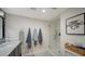 Elegant bathroom with double vanity and walk-in shower at 3745 Almeria Ave # 3S, Sarasota, FL 34239