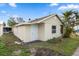 View of the exterior of a home showcasing a detached structure in the backyard at 3919 116Th Street W Ct, Bradenton, FL 34210