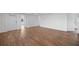Spacious living area featuring light brown wood-look flooring at 3919 116Th Street W Ct, Bradenton, FL 34210