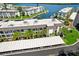 Condo building with covered parking and waterfront access at 4330 Falmouth Dr # 108, Longboat Key, FL 34228