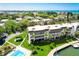 Condo building with pool and private boat dock at 4330 Falmouth Dr # 108, Longboat Key, FL 34228