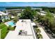 Aerial view showing building, pool, and surrounding landscape at 4330 Falmouth Dr # 108, Longboat Key, FL 34228