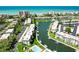 Aerial view of waterfront community with pool and boat slips at 4330 Falmouth Dr # 108, Longboat Key, FL 34228