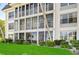 Building exterior showcasing balconies and lush landscaping at 4330 Falmouth Dr # 108, Longboat Key, FL 34228