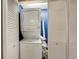 Convenient laundry closet with stackable washer and dryer at 4330 Falmouth Dr # 108, Longboat Key, FL 34228