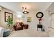 Bright living room with a comfortable seating arrangement and decorative accents at 4330 Falmouth Dr # 108, Longboat Key, FL 34228