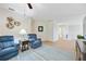 Bright loft area with wood floors and comfortable seating at 4504 Cinnamon Dr # 2308, Sarasota, FL 34238