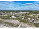 Beautiful community with mature trees, beachfront access and meticulously maintained landscaping at 461 Nokomis S Ave, Venice, FL 34285
