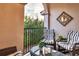 Balcony featuring comfortable seating and a view, creating an inviting outdoor living space at 461 Nokomis S Ave, Venice, FL 34285