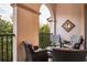 Cozy balcony featuring comfortable seating and decorative accents, perfect for relaxation at 461 Nokomis S Ave, Venice, FL 34285