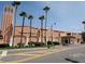 Exterior view of Venice Theatre with beautiful architecture and palm trees at 461 Nokomis S Ave, Venice, FL 34285