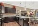 Well-appointed kitchen featuring stainless steel appliances and a breakfast bar at 461 Nokomis S Ave, Venice, FL 34285