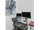 Functional home office space with desk, chair, and modern artwork at 461 Nokomis S Ave, Venice, FL 34285