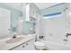 Clean bathroom with a tub, sink, and vanity at 4877 Post Pointe Dr, Sarasota, FL 34233