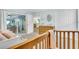 bedroom with daybed, crib, and backyard access at 4877 Post Pointe Dr, Sarasota, FL 34233