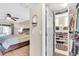 Bright walk-in closet with ample shelving and drawers at 4877 Post Pointe Dr, Sarasota, FL 34233