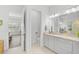Double vanity bathroom with a modern design, granite countertops, and a spacious layout at 5035 Kiva Cir, Bradenton, FL 34211