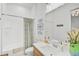 Clean bathroom with a shower/tub combo, modern vanity and white subway tiles at 5035 Kiva Cir, Bradenton, FL 34211